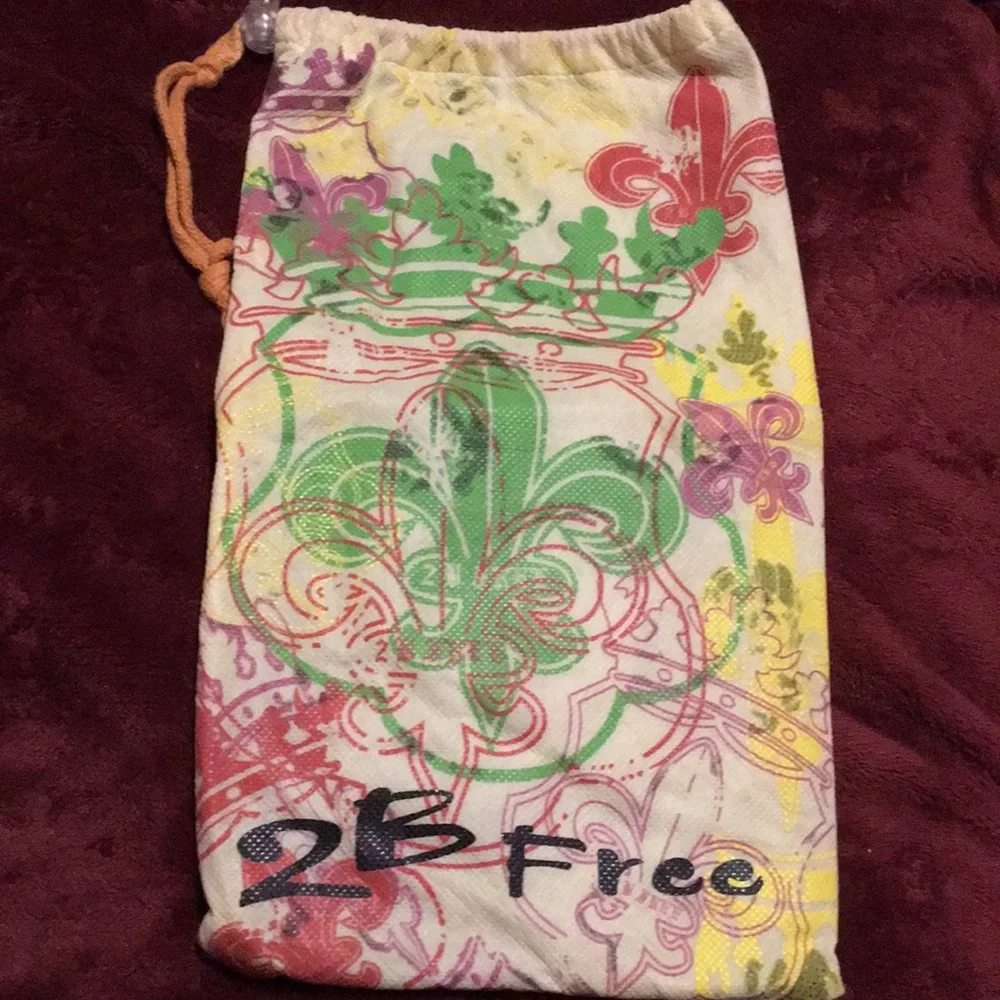 DUST BAG Fleur de lis  13” inches high and 7”inches across wide